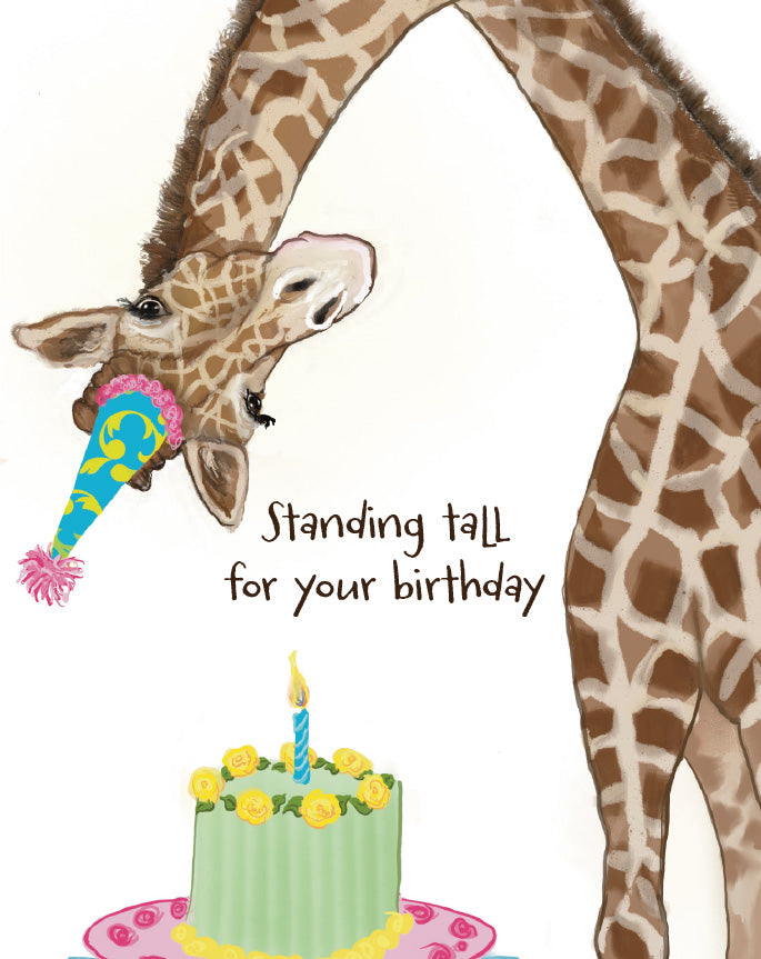 Giraffe birthday card illustration with a cartoon giraffe leaning over a birthday cake and the text 'Standing tall for your birthday'. Original artwork by Susan J. York.