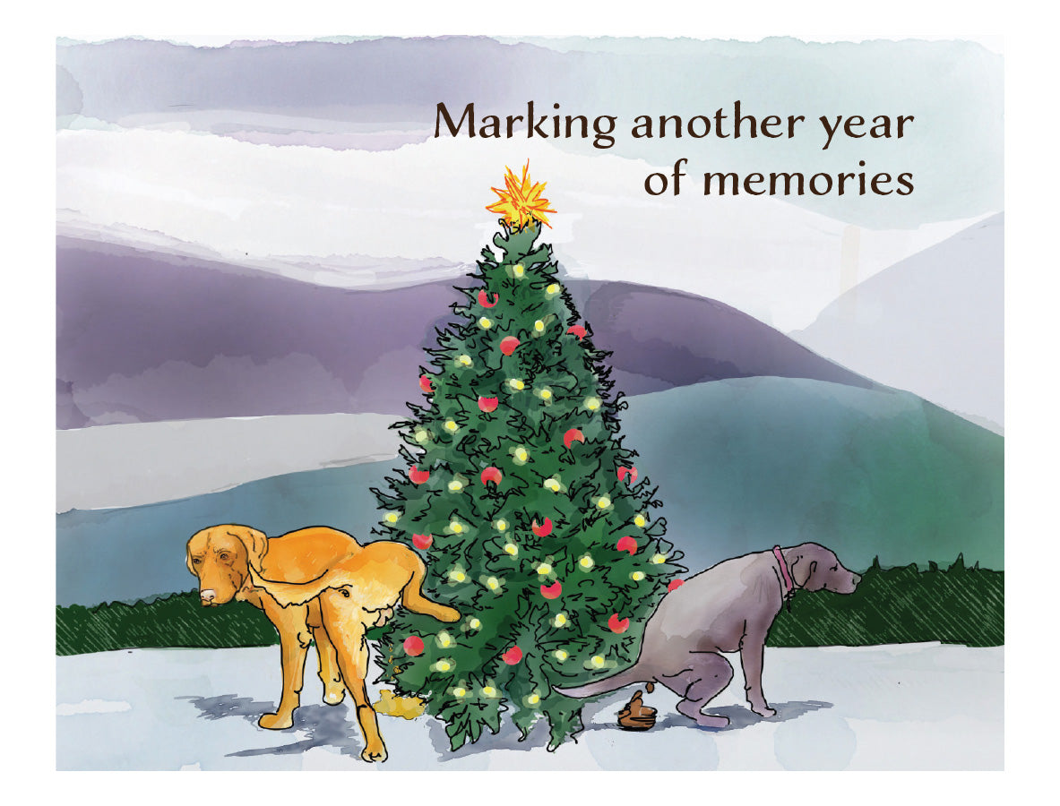 Humorous Christmas dog greeting card featuring original watercolor artwork by Susan J. York of two dogs marking a decorated Christmas tree in a snowy landscape, with the message “Marking another year of memories.”